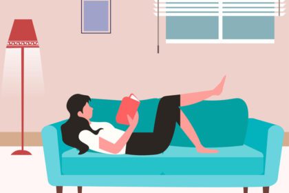 girl lying on a sofa reading a book, blog post image for mother's day post on read2write